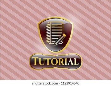  Gold emblem or badge with notebook with pencil icon and Tutorial text inside