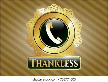  Gold emblem or badge with old phone icon and Thankless text inside