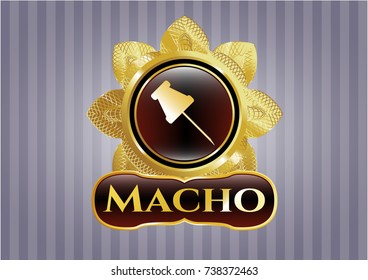  Gold emblem or badge with paper pin icon and Macho text inside