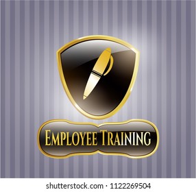  Gold emblem or badge with pen icon and Employee Training text inside