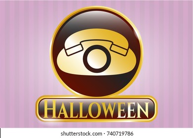  Gold emblem or badge with phone icon and Halloween text inside