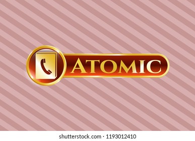  Gold emblem or badge with phonebook icon and Atomic text inside