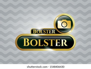  Gold emblem or badge with photo camera icon and Bolster text inside