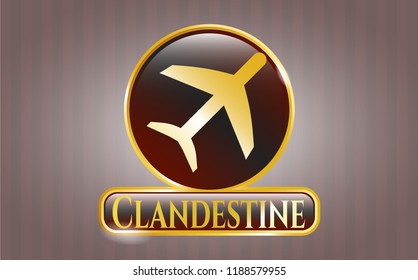  Gold emblem or badge with plane icon and Clandestine text inside