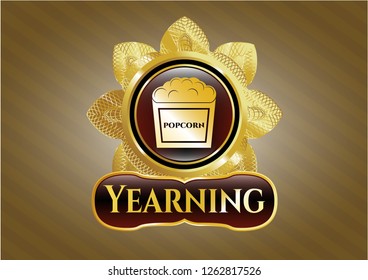  Gold emblem or badge with popcorn icon and Yearning text inside