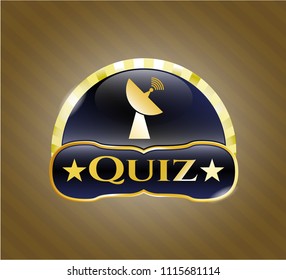  Gold emblem or badge with radar icon and Quiz text inside