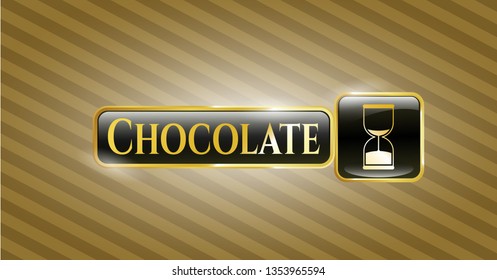  Gold emblem or badge with sand clock icon and Chocolate text inside