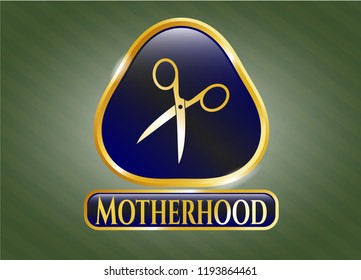  Gold emblem or badge with scissors icon and Motherhood text inside