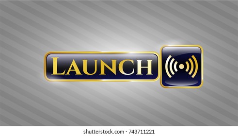  Gold emblem or badge with signal icon and Launch text inside