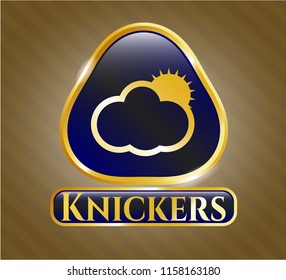  Gold emblem or badge with sun behind cloud icon and Knickers text inside