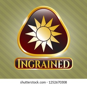  Gold emblem or badge with sun icon and Ingrained text inside