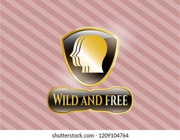  Gold emblem or badge with team work icon and Wild and free text inside