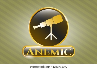  Gold emblem or badge with telescope icon and Anemic text inside