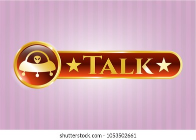 Gold emblem or badge with ufo with aline inside icon and Talk text inside