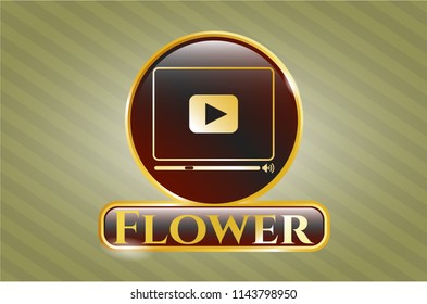  Gold emblem or badge with video player icon and Flower text inside