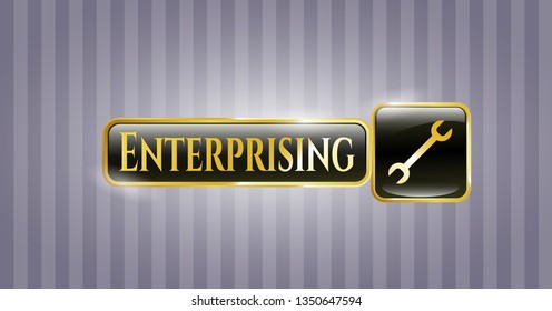  Gold emblem or badge with wrench icon and Enterprising text inside