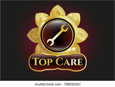  Gold emblem or badge with wrench icon and Top Care text inside