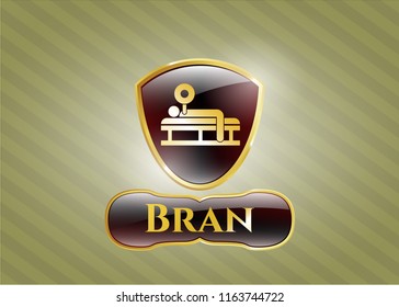  Gold emblem with bench press icon and Bran text inside