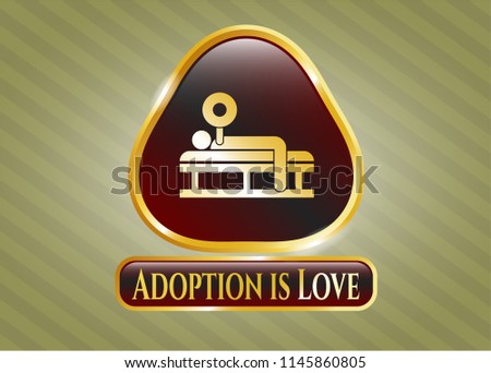  Gold emblem with bench press icon and Adoption is Love text inside