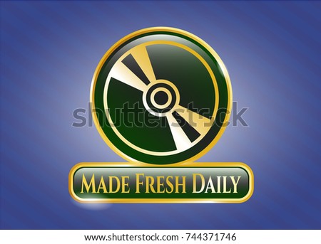  Gold emblem with CD or DVD disc icon and Made Fresh Daily text inside