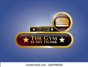 Gold emblem with cheeseburger icon and The Gym is My Home text inside