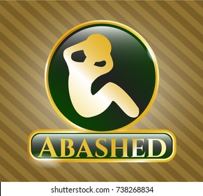  Gold emblem with crunch icon and Abashed text inside