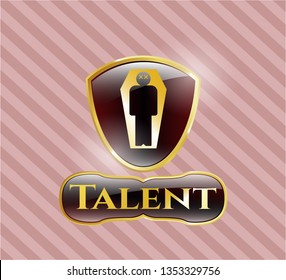  Gold emblem with dead man in his coffin icon and Talent text inside