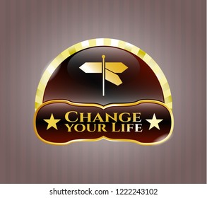  Gold emblem with directions sign icon and Change your Life text inside