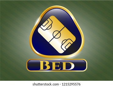  Gold emblem with football field icon and Bed text inside