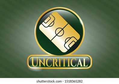  Gold emblem with football field icon and Uncritical text inside
