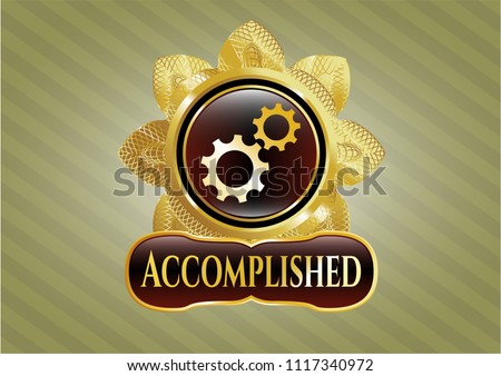  Gold emblem with gear, team work icon and Accomplished text inside