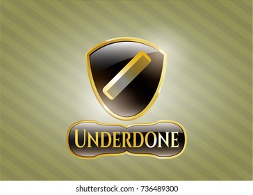  Gold emblem with hair comb icon and Underdone text inside