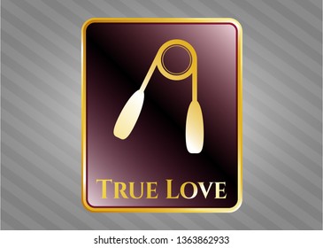  Gold emblem with hand gripper icon and True Love text inside
