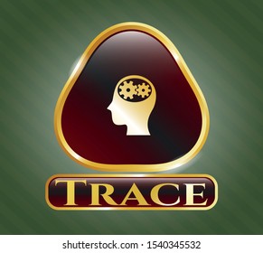  Gold emblem with head with gears inside icon and Trace text inside
