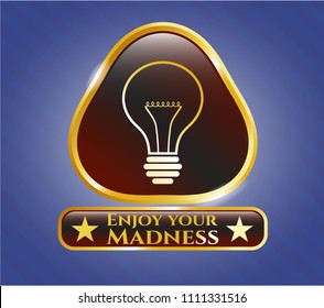   Gold emblem with idea icon and Enjoy your Madness text inside