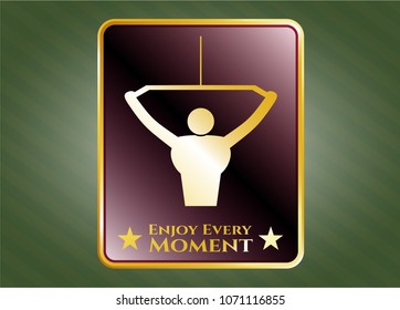  Gold emblem with lat pull down, exercise icon and Enjoy Every Moment text inside
