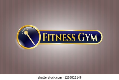  Gold emblem with magic stick icon and Fitness Gym text inside