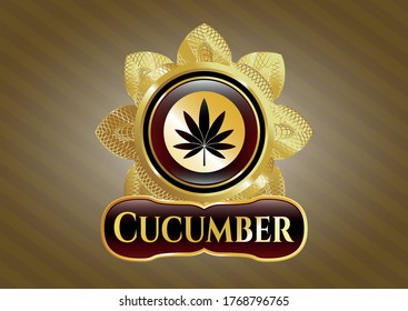 Gold emblem with marijuana leaf icon and Cucumber text inside