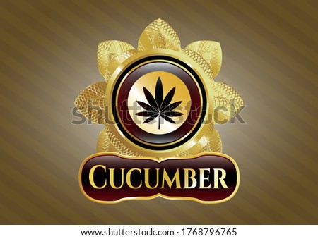 Gold emblem with marijuana leaf icon and Cucumber text inside
