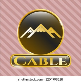  Gold emblem with mountain icon and Cable text inside