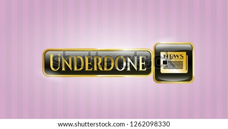  Gold emblem with newspaper icon and Underdone text inside