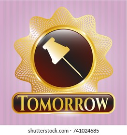  Gold emblem with paper pin icon and Tomorrow text inside