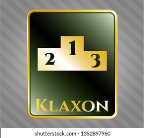  Gold emblem with podium icon and Klaxon text inside