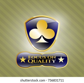  Gold emblem with poker clover icon and Focus on Quality text inside
