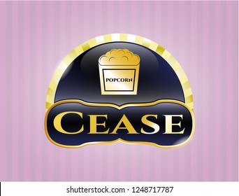  Gold emblem with popcorn icon and Cease text inside