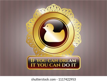  Gold emblem with rubber duck icon and If you can dream it you can do it text inside