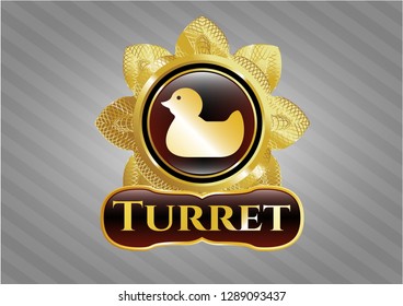  Gold emblem with rubber duck icon and Turret text inside