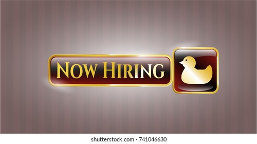  Gold emblem with rubber duck icon and Now Hiring text inside