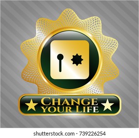  Gold emblem with safe, safety deposit box icon and Change your Life text inside