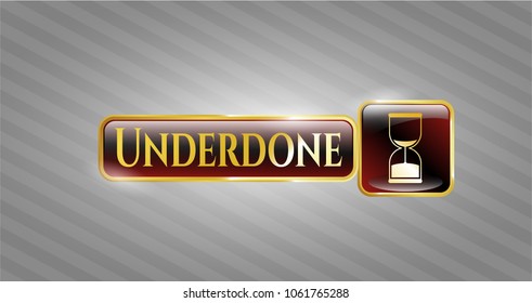  Gold emblem with sand clock icon and Underdone text inside